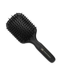 The paddle brush is designed for fast and effective styling on mid to long hair. Charlotte Mensah Paddle Brush Black Cult Beauty Cult Beauty