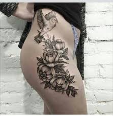 Bird And Rose Tattoo Meaning Thigh Flower And Bird Tattoo Hip Tattoos Women Thigh Tattoo Flower Hip Tattoos