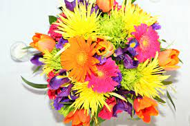 Spring Bridal Bouquet With Yellow Fuji Mums Orange And Fuchsia Gerber Daisies Purple Iris And Orange Bridal Bouquet Spring Flower Decorations Bridal Bouquet