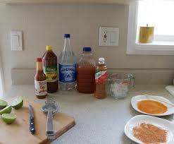 This michelada recipe asks for chamoy, tajin, tomato cocktail juice, shrimp stock, lime juice, salt, pepper, mexican worcestershire sauce, guacamaya hot sauce, and beer. Non Alcoholic Michelada Recipe Mommies In Spanglish