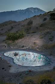 A boy is playing in the bathtub while wearing only underwear. Nudist Colony Swimming Pool From The 1930 S Now Famous In The Skateboarding Community Known As The Nude Bowl Urbanexploration
