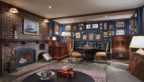 The french drain will gather all of the moisture and discard it out of the basement. French Burgundy Tudor Traditional Basement Minneapolis By Twist Interior Design Houzz