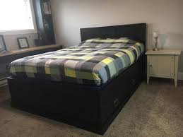 Queen captain's beds are a unique style of bed that feature storage both underneath the bed frame and shelving at the headboards or along the length of the bed. Queen Size Captains Bed Fjell Model From Ikea Classifieds For Jobs Rentals Cars Furniture And Free Stuff