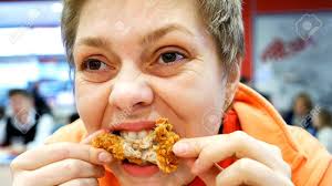 These $50 chicken nuggets were grown in a lab. Young Woman Eats Fast Food Chicken Nuggets Wings In Cafe Restaurant Stock Photo Picture And Royalty Free Image Image 74961752