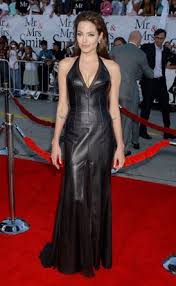 Angelina Jolie In Here Iconic Leather Dress At The Premiere Of Mr And Mrs Smith Be Inspired And Shop Here Ht Versace Gown Leather Dresses Red Carpet Looks
