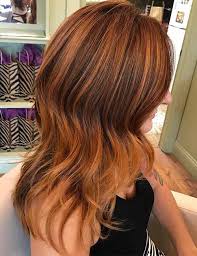 Add a few highlights to make your curls pop. Copper Hair With Blonde And Brown Highlights Novocom Top