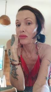 cat sleeping in a funny position