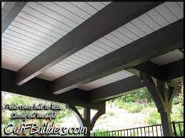 By extending the steps the length of the deck, you not only will successfully hide the underside of the deck, but you'll also create an open, graceful transition from the deck to the garden beyond. Paint Underside Of Deck To Make A Patio Roof They Used Tongue And Groove Boards Patio Ceiling Ideas Patio Roof Patio Design