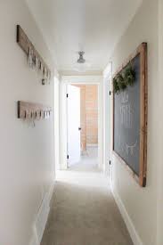 A Farmhouse Style Hallway Makeover Making It In The Mountains Hallway Designs Hallway Paint Narrow Hallway Decorating