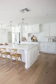 The Lifestyled Company Del Caverna Dos Project White Kitchen White Cabinets White Cabin White Kitchen Hardwood Floors Wood Floor Kitchen Oak Floor Kitchen