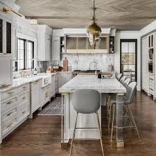 Under A Wood Herringbone Pattern Ceiling This Stunning Gray And Gold Kitchen Features Vintage Bras Interior Design Kitchen Kitchen Interior Kitchen Renovation