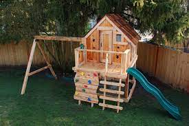 Building our backyard castle with wood naturally fort roundup emily henderson : Kids Wood Playhouse Ideas On Foter