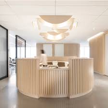 Slatted Wood And Ambient Lighting Are Intended To Make Visitors Feel More At Ease At This Orthodonti Clinic Interior Design Clinic Design Medical Clinic Design