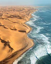 It reaches inland 80 to 100 miles (130 to 160 km) to the foot of the great escarpment. Temple Of Leaves On Instagram Desert Meets The Ocean In Namibia Bc Africa Pho Beautiful Places On Earth Beautiful Places Nature Travel Around The World