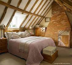 Attic Bedroom In A Wooden Beamed Cottage In Oxfordshire Home Home Decor Bedroom Design