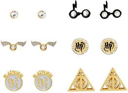 Harry first sees the symbol of the deathly hallows when xeno appears at bill and fleur's wedding wearing the symbol she is an unregistered animagus who can transform into a beetle, a fact that makes it easy for her to eavesdrop. Amazon Com Harry Potter Symbols Stud Earrings Set Of 6 Pairs Clothing