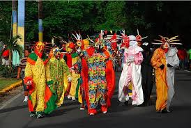 A vejigante is a traditional character seen during the carnival celebration on the island. Vejigantes Caminando Por Las Calles En Las Fiestas De Santiago Apostol Puerto Rico Puerto Rican Festival Puerto Rico Vacation