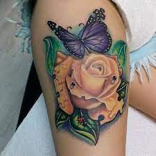 Colorful rose & butterfly with stars tattoo on thigh. 100 Butterfly Rose Tattoo Design 1080x1080 2021