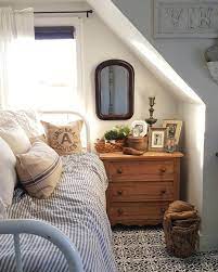A Comfy Bed With A Small Dresser Home Decor Bedroom Small Attic Bedroom Small Bedroom