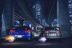 Hd Wallpaper Nissan Toyota Cars Supra Skyline Sport R34 Exhaust Nigth Wallpaper Flare Nissan Gtr R34 Nissan Nissan Gtr Skyline