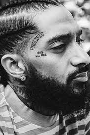 Rick ross gets new tattoo honoring nipsey hussle billboard. Meanings Behind Nipsey Hussle S Tattoos New Images Also Celebrities With Nipsey Hussle Tattoos Tattoo Me Now