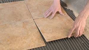 Laying large floor tiles level. How To Use A Laser Level For Laying Tiles