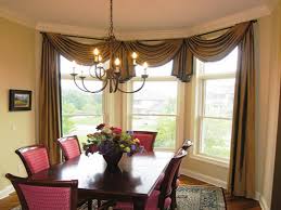 Beautiful layering of curtains in a dining room. Bay Wall Window Curtain Idea Window Treatments Living Room Dining Room Curtains Dining Room Windows