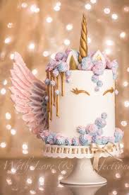 A silver horn, some cute little unicorn ears and a few wired stars finish the magical look. The 10 Most Magical Unicorn Cake Ideas On Pinterest Shimmer Confetti