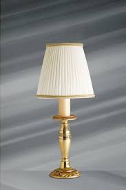 L'usage de tissu coloré et fleuri favorise la création d'un environnement bohème. Petite Lampe En Bronze Massif De Style Empire Abat Jour Plisse Ivoire Lucien Gau Luminaires Classiques De Prestige Ref 16060130