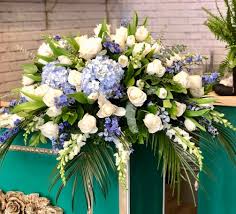 Other relatives and close friends have a wide range of options and may choose from wreaths, hearts, cushions or custom tributes to honour if you send flowers to a funeral, always include a card so that the family know who the flowers are from. Deep Blue Ocean Casket Spray By The Roots And Blooms