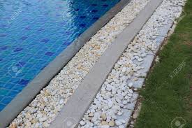 Maybe you would like to learn more about one of these? Swimming Pool Grating Covered With Round White River Pebble Stock Photo Picture And Royalty Free Image Image 125044643
