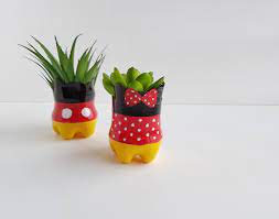 I will show you how with this easy diy. Upcycling Plastic Bottles Into Mickey Mouse Flower Pots Kim And Carrie