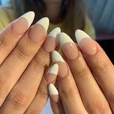 Bella Hadid Just Remixed Her Deep French Manicure Almond Nails French Nail Tip Designs French Tip Nail Art