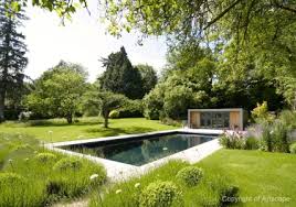 Modern design with glass construction. Garden Design With Contemporary Swimming Pool
