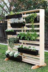Adding window boxes, hanging pots, or a garden structure such as a trellis or tuteur also provides additional exterior vertical growing space. 20 Diy Vertical Garden Ideas How To Make A Vertical Garden Vertical Garden Diy Vertical Garden Planters Vertical Herb Garden