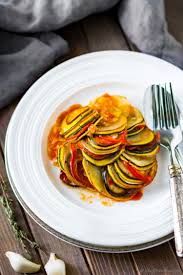 Ratatouille Layers Of Yellow Squash Zucchini Eggplant Potato And Bell Pepper On A Bed Of Flavorful Tomato An Ratatouille Recipe Recipes Veggie Dinner