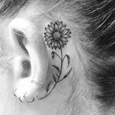 Rocking Sunflower Tattoo Behind The Ear Beautytatoos With Images Sunflower Tattoo Design Tattoos Sunflower Tattoo