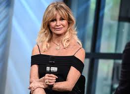 Achieve Goldie Hawns Stylishly Cozy Winter Look with This Faux Fur Jacket