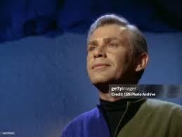 Michael Strong as Dr. Roger Korby in the News Photo