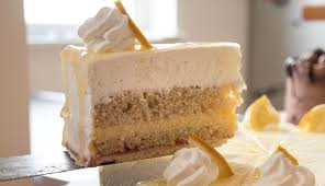 Dieses Rezept Fur Eine Vegane Version Einer Zitronen Sahne Torte Sieht Nicht Nur Ziemlich Schon Und Frisch Aus Sondern S Kuchen Ohne Milch Rezepte Sahnekuchen