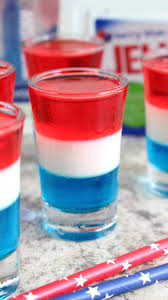 Pour onto the blue and white layer, cover with plastic wrap, and refrigerate until completely set. Layered Jello Shots For Fourth Of July Red White And Blue