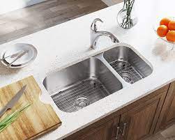 This is the most common sink material found on the market. 3218bl Offset Double Bowl Undermount Stainless Steel Sink