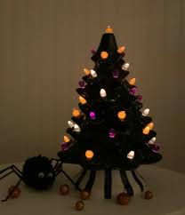 The leaky cauldrons, witch brooms and pumpkins really brighten my day. Hand Painted Lighted Ceramic Halloween Tree 14