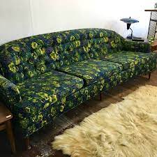 Designer palmer weiss covered two swivel chairs and several pillows in it, then carried the aubergine, soft brown, and olive tones throughout the rest of the room. Pin By Lezel Herrin On Home Decor In 2021 Floral Sofa Living Room Decor Home Decor