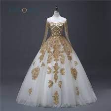 Brides who want to truly feel like royalty on their wedding day should opt for a gold ball gown wedding dress just like this magnificent design by elio abou fayssal. Gold Wedding Dress 2019 Lace Bridal Gowns Long Sleeves Vintage Ball Gown Vestido De Festa Robe De Mariee Lucurious Dress Gold Wedding Dress Wedding Dress 2017bridal Gowns Long Sleeves Aliexpress