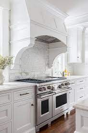 A basic hood vent rests 24 to 30 in (61 to 76 cm) above a stovetop. The Dough Bowls Have Come To Town The Enchanted Home Curved Kitchen White Kitchen Remodeling Kitchen Hoods