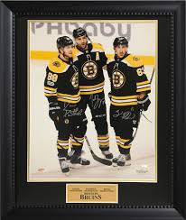 Born may 11, 1988) is a canadian professional ice hockey left winger and alternate captain for the boston bruins of the national hockey league (nhl). David Pastrnak Patrice Bergeron Brad Marchand Multi Autograph Photo Stand 20x24 New England Picture