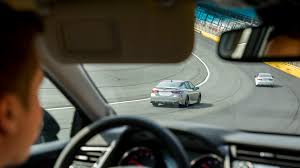 It's distracting to me to have 2 rear view mirrors. A Lap Around The New Charlotte Roval Road Course The Drive
