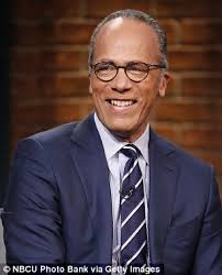 NBC News anchor Lester Holt congratulates his son