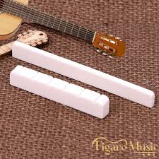 If your guitar's bridge doesn't allow you to adjust the height for each string, you. Classic Nylon Guitar Saddle Nut Guitar Bridge Nut Saddle Shopee Philippines
